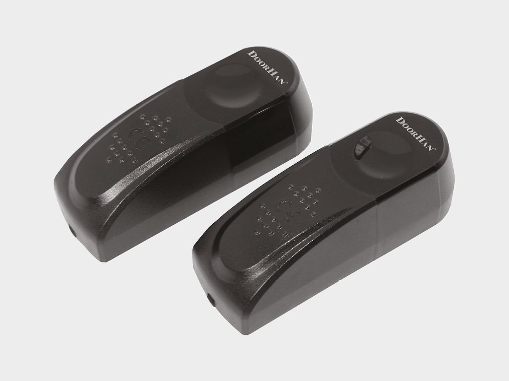 Фотоэлементы безопасности (предназначены для обнаружения людей, животных и посторонних предметов в проеме ворот при движении полотна для исключения травматизма)